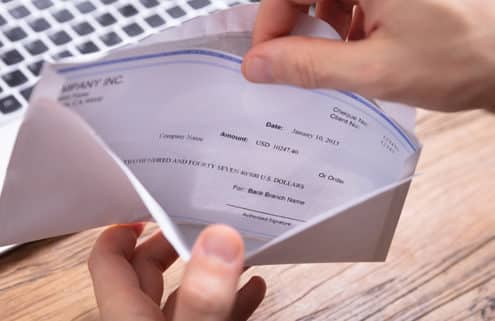 How to Use the Word to Print on Payroll Checks and Stubs